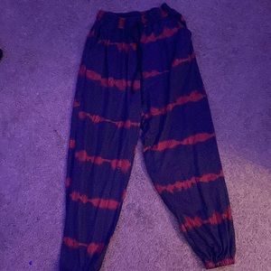 black sweatpants with red stripes